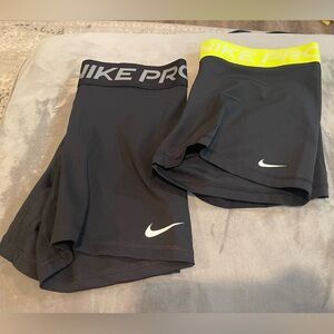 Set of 2 women’s Nike spandex. One is L, one is XL. BARELY WORN.